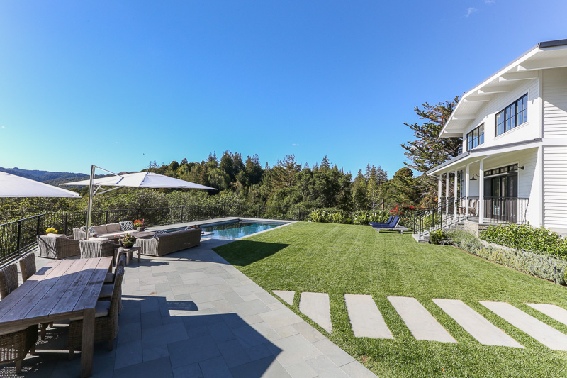 canyon house backyard with seating area and pool